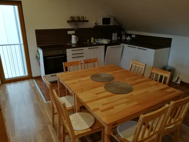 Kuchyně a jídelna podkrovního apartmánu