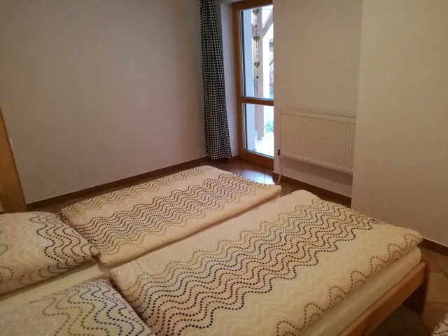 Ložnice přízemního apartmánu