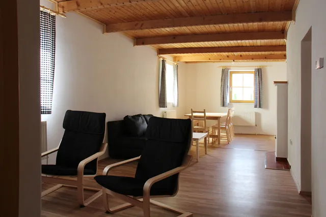 Obývací a jídelní část přízemního apartmánu